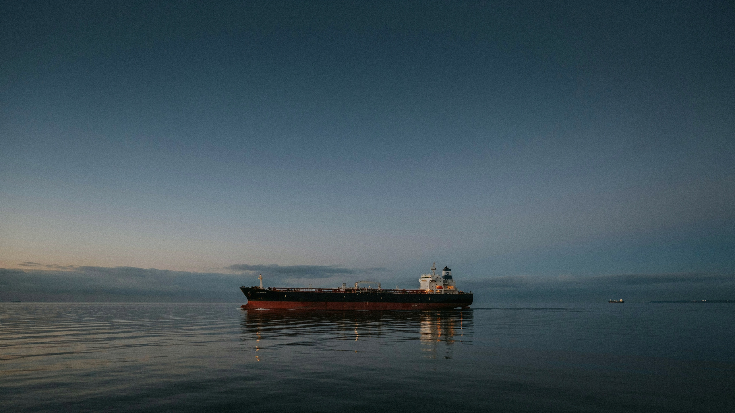 Oil tanker at sea at dusk